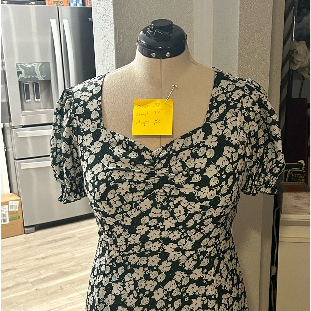 Dark green with white flowers